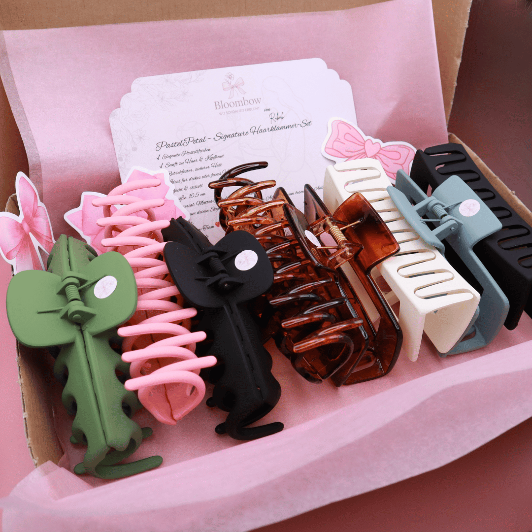 Set of pastel-colored Haarklammern with matte finish, strong hold, and gentle grip, displayed in eco-friendly packaging.