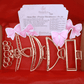 Golden Belle Signature Claw Clip Set with five elegant gold-colored metal hair clips in various designs for strong, stylish hold.